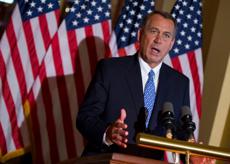 House Speaker John Boehner of Ohio gestures while speaking outside his office on Capitol Hill in Washington, Tuesday, Oct. 8, 2013. President Barack Obama stepped up pressure Tuesday on the Boehner to hold votes to reopen the federal government and prevent a potentially disastrous U.S. government default. Obama spoke to reporters at the White House a few hours after calling Boehner and urging him to drop demands that the votes be tied to Republican demands for dismantling Obama's health care law and cutting federal spending.  (AP Photo/ Evan Vucci)