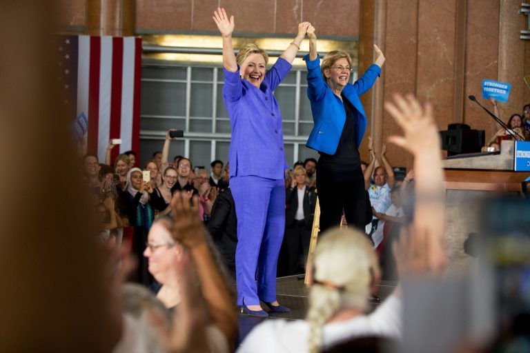 Democratic presidential candidate Hillary Clinton, accompanied by Sen. Elizabeth Warren, D-Mass., arrives to speak at the Cincinnati Museum Center at Union Terminal in Cincinnati, Monday, June 27, 2016. (AP Photo/Andrew Harnik)