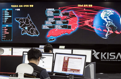 Employees watch electronic boards monitoring possible ransomware cyberattacks at the Korea Internet and Security Agency in Seoul, South Korea. Beyond the frequently used shorthand that North Korea was behind the 