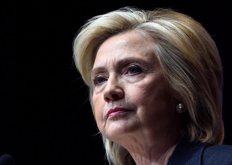 Hillary Clinton is trouncing Donald Trump among Latinos, Asian Americans and pro-immigration groups, but that doesn't mean they're optimistic that Clinton can actually deliver immigration reform. (AP Photo/David Becker)