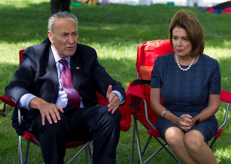 House Minority Leader Nancy Pelosi of Calif. accompanied by Senate Minority Leader Chuck Schumer of N.Y. speaks with DREAMERS who are holding a 4-day fast on Capitol Hill in Washington, Thursday, Sept. 7, 2017. House and Senate Democrats gather to call for Congressional Republicans to stand up to President Trump's decision to terminate the Deferred Action for Childhood Arrivals (DACA) initiative by bringing the DREAM Act for a vote on the House and Senate Floor. ( AP Photo/Jose Luis Magana)