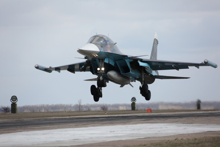 A post on the Russian Defense Ministry's Facebook page said one of its Su-34 planes carried out a strike against a large concentration of Islamic State militants Maaratat-Um-Haush in Aleppo province and killed up to 40 people. (Olga Balashova/Russian Defense Ministry Press Service via AP)