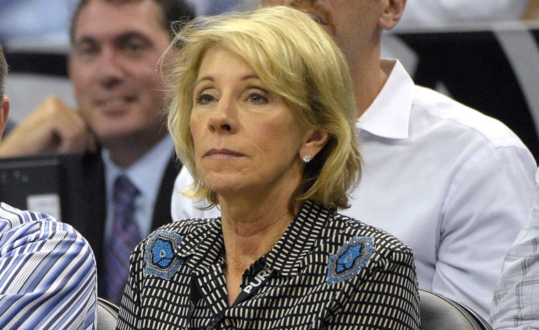 Betsy DeVos has worked for more than 20 years to promote school choice and charter schools in Michigan and across the nation. (AP Photo/Phelan M. Ebenhack)