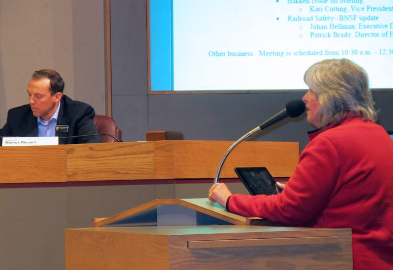 Bonnie Mager of Cheney, Wash., testifies at a state Senate hearing in this photo taken on Tuesday, June 17, 2014,  in Spokane, Wash. The hearing focused on the safety of crude oil rail cars moving through the state.  (AP Photo/Nicholas K. Geranios)