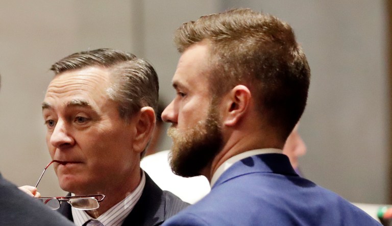 May 2, 2019, House Speaker Glen Casada, R-Franklin, left, talks with Cade Cothren, right, his chief of staff, during a House session in Nashville, Tenn.