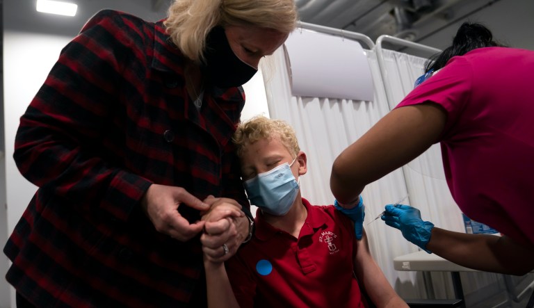 ‘It is absolutely our business’ to know who gets vaccinated, Biden health secretary says