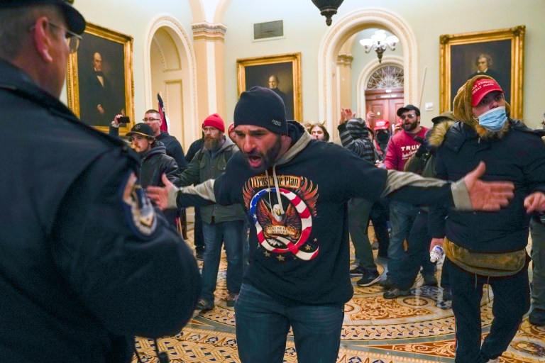 Trump under pressure to condemn violence after his supporters attack Capitol