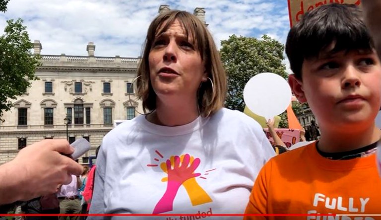Jess Phillips, a British member of Parliament, speaks during an interview at a protest in London.