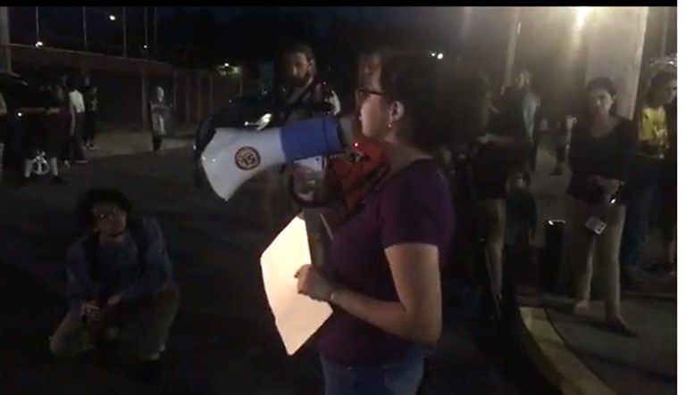 Protesters from Never Again Action, a Jewish group, stand in front of an ICE facility in Rhode Island.