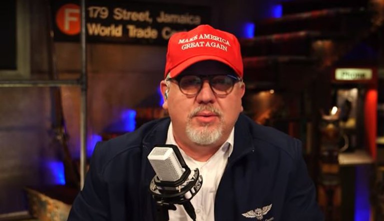 Glenn Beck dons a "Make America Great Again" hat during his show.