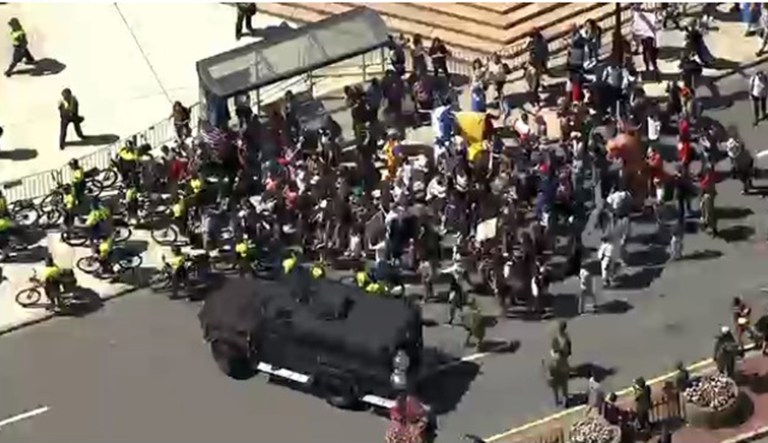 Law enforcement officers are seen near a Straight Pride Parade in Boston.