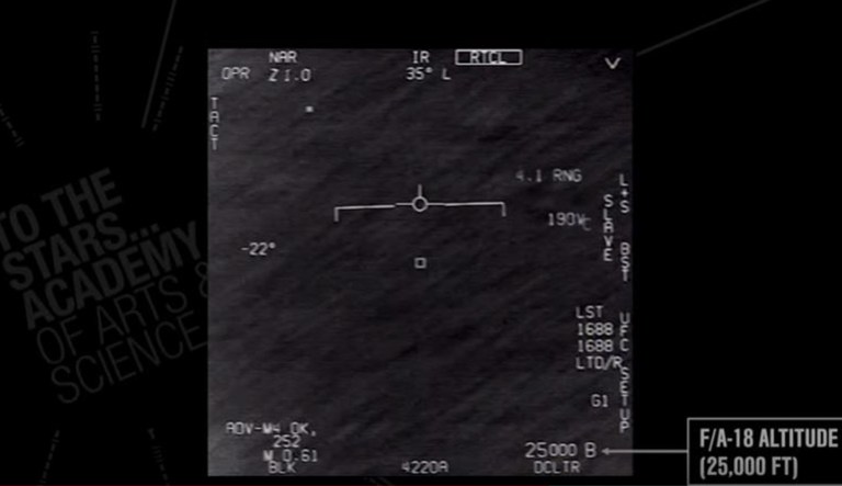 A video showing a jet trying to track down an unidentified flying object via instrumentation is shown.