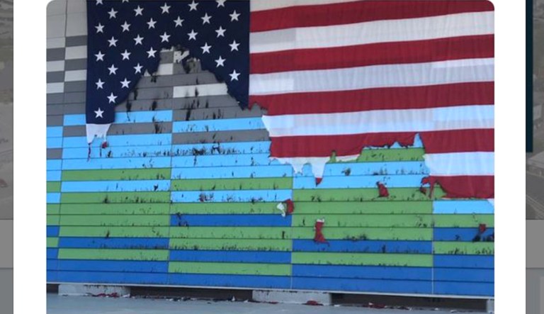 A photo from Fishers, Indiana, Mayor Scott Fadness shows a burnt U.S. flag.