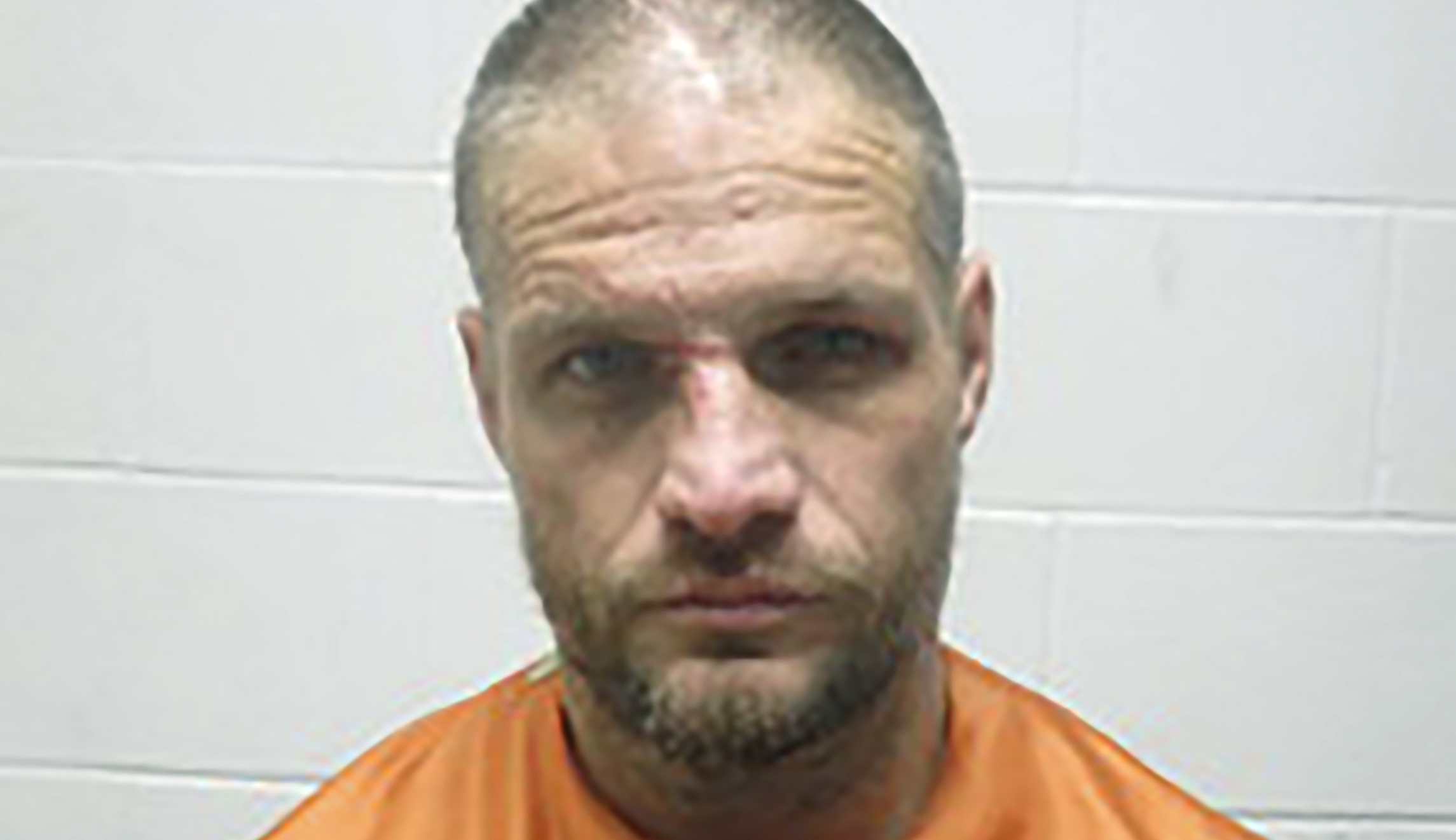 Man charged with stealing truck and holding passenger and goat hostage across three states