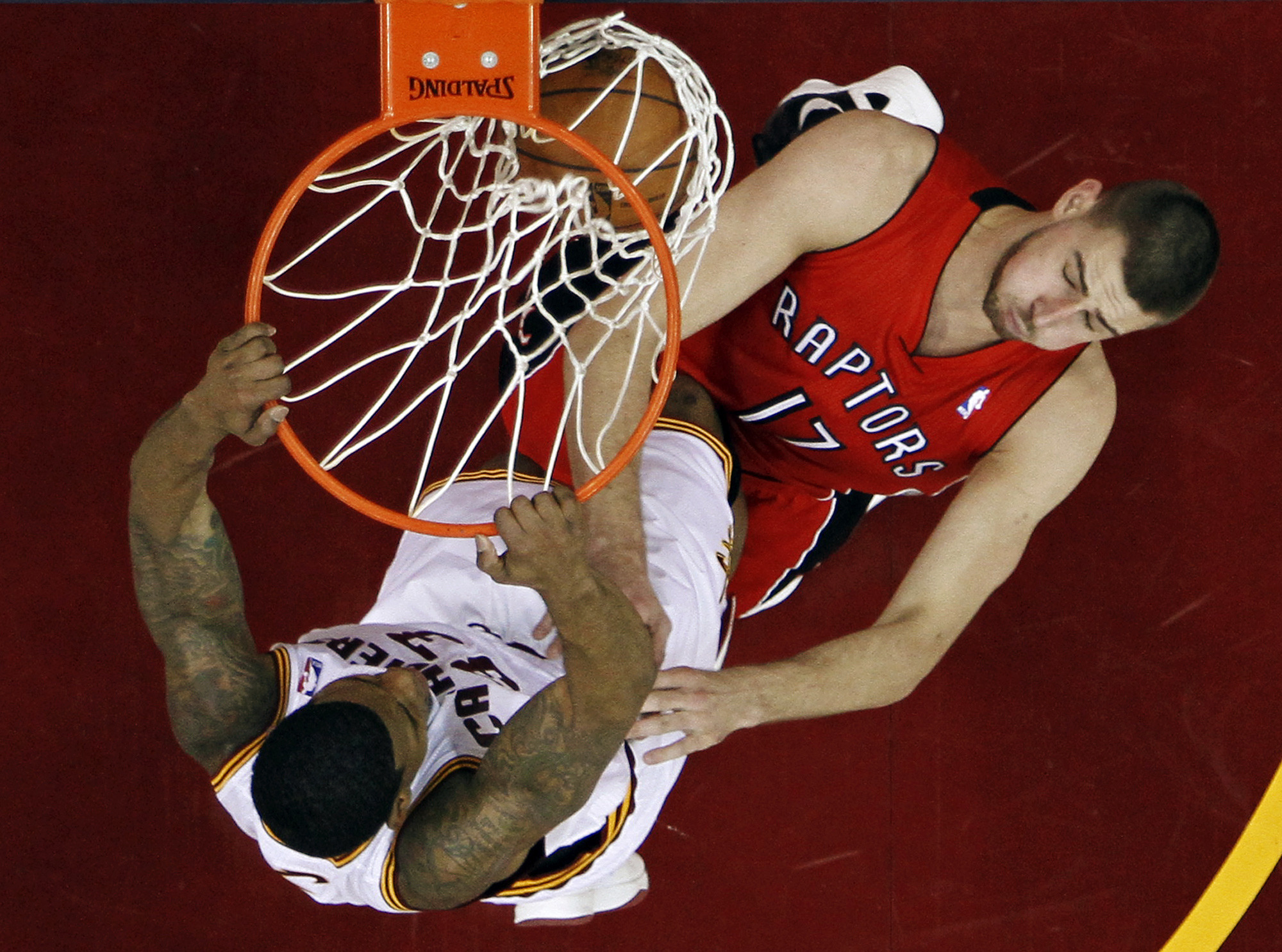 Calderon leads Raptors past Cavaliers 113-99