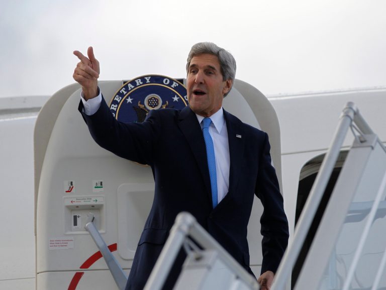 In this Nov. 10, 2013, photo, U.S. Secretary of State John Kerry steps aboard his aircraft in Geneva, Switzerland. Nuclear talks with Iran have failed to reach agreement, but Kerry said differences between Tehran and six world powers made 