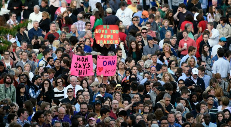 People wait for Pope Francis to appear from the Speaker's Balcony on Capitol Hill in Washington, Thursday. The Pope will address a joint meeting of Congress making him the first pontiff in history to do so. (AP Photo/Susan Walsh)