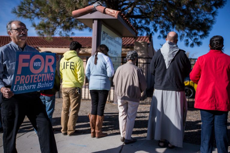 Anti-abortion advocates and members of 
