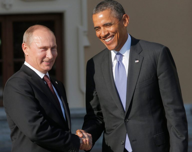 Russia's President Vladimir Putin, left, shakes hands with U.S. President Barack Obama during arrivals for the G-20 summit at the Konstantin Palace in St. Petersburg, Russia on Thursday, Sept. 5. (AP/Dmitry Lovetsky)