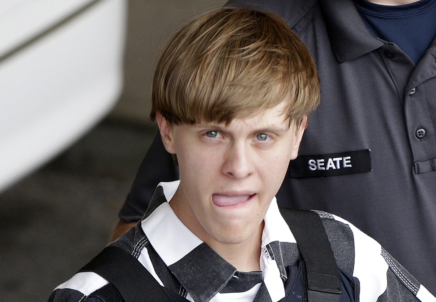 Charleston church shooter Dylann Roof pleads guilty to state murder charges, will await execution in federal prison