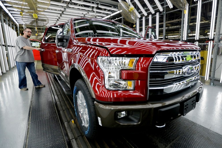 Ford Motor Company is canceling plans to build a new $1.6 billion plant in Mexico and is instead investing $700 million in a Michigan plant extension. (AP Photo/Charlie Riedel, File)