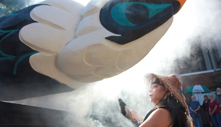 The ceremony requires a container, traditionally a shell representing water, sacred plants (cedar, sage, sweetgrass, and tobacco), fire produced from lighting the sacred plants, and smoke produced from the fire. (AP Photo/Manuel Valdes)