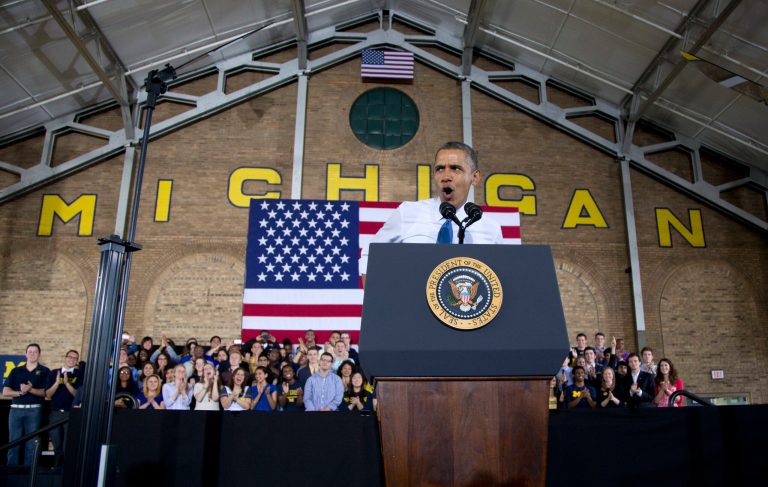 President Barack Obama speaks at the University of Michigan, Wednesday, April 2, 2014, in Ann Arbor, Mich., about his proposal to raise the national minimum wage. (AP Photo/Carolyn Kaster)