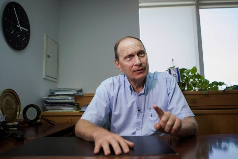 Israeli Medical Association president Dr. Leonid Eidelman speaks during an interview with The Associated Press at his office in Ramat Gan, Israel, Thursday, June 19, 2014. Dr. Eidelman says in an interview that doctors 