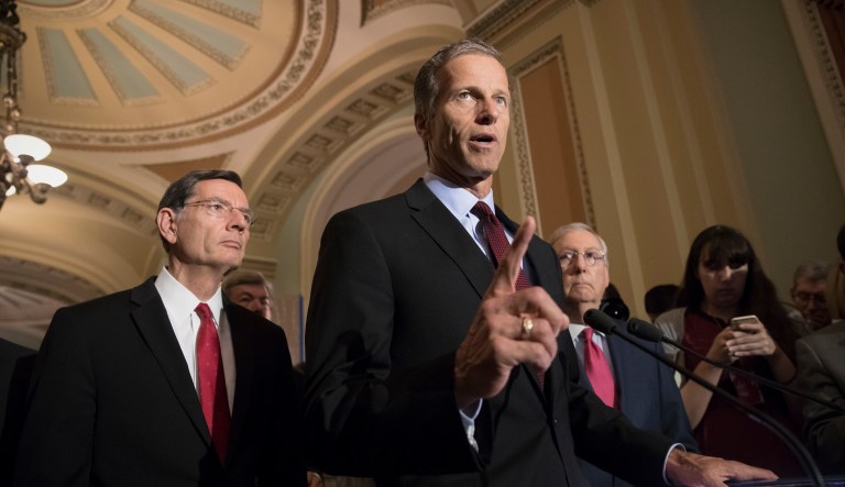 Sen. John Thune, R-S.D., joined by Sen. John Barrasso, R-Wyo., left, and Senate Majority Leader Mitch McConnell of Ky., right, reacts to questions from reporters about President Donald Trump reportedly sharing classified information with two Russian diplomats during a meeting in the Oval Office, Tuesday, May 16, 2017, on Capitol Hill in Washington. (AP Photo/J. Scott Applewhite)