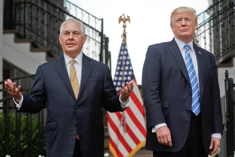 FILE - In this Aug. 11, 2017, file photo, Secretary of State Rex Tillerson, left, speaks following a meeting with President Donald Trump at Trump National Golf Club in Bedminster, N.J. The strained relationship between President Donald Trump and Secretary of State Rex Tillerson came under renewed focus Sunday, Oct. 15, during an interview with Jake Tapper on CNN, as Tillerson insisted that Trump has not undermined him even as he again refused to deny calling the president 
