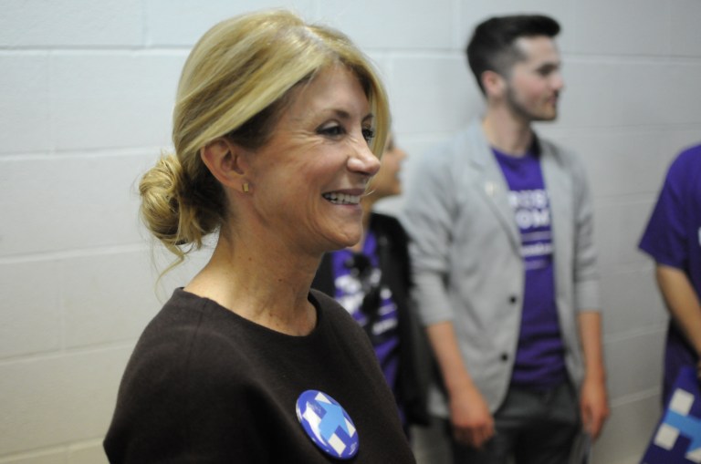 Davis says there is still a stigma that women can't lead in an executive role as well as men. (AP Photo/James Nord)