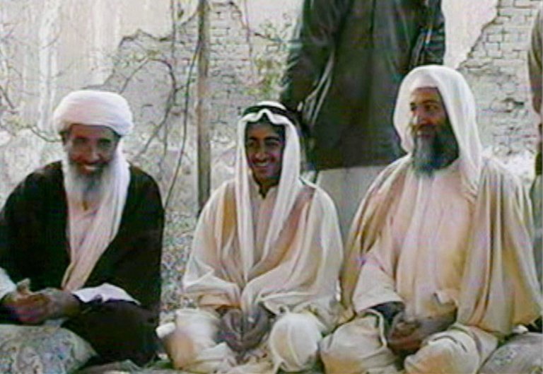 Al-Masri (left), an Egyptian, originally joined al Qaeda in Afghanistan, later moved to its Syrian affiliate. (AP Photo/Al-Jazeera/TV)