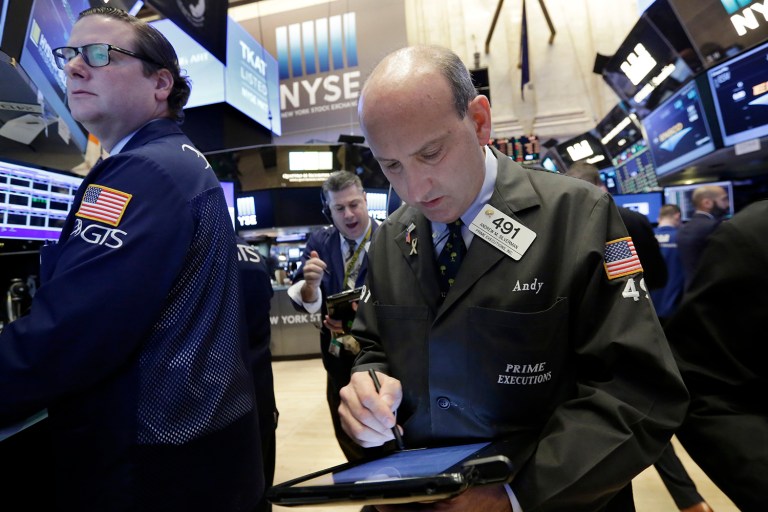 Stock markets opened lower Monday amid continued investor concerns that Republicans' failure Friday to advance healthcare legislation spells trouble for President Trump's broader legislative agenda. (AP Photo/Richard Drew)
