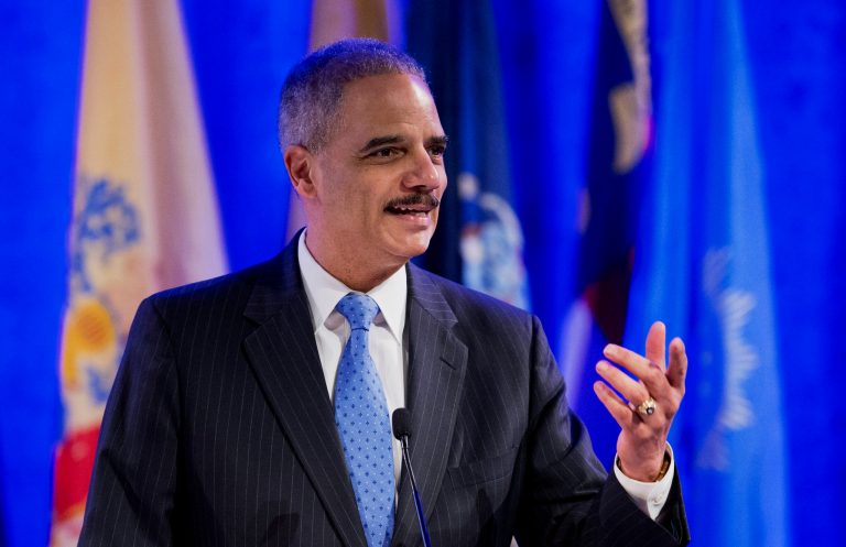 Attorney General Eric Holder speaks at the annual Attorneys General Winter Meeting in Washington, Tuesday, Feb. 25, 2014. Holder said state attorneys general are not obligated to defend laws in their states banning same sex-marriage if they don't believe in them.  (AP Photo/Manuel Balce Ceneta)