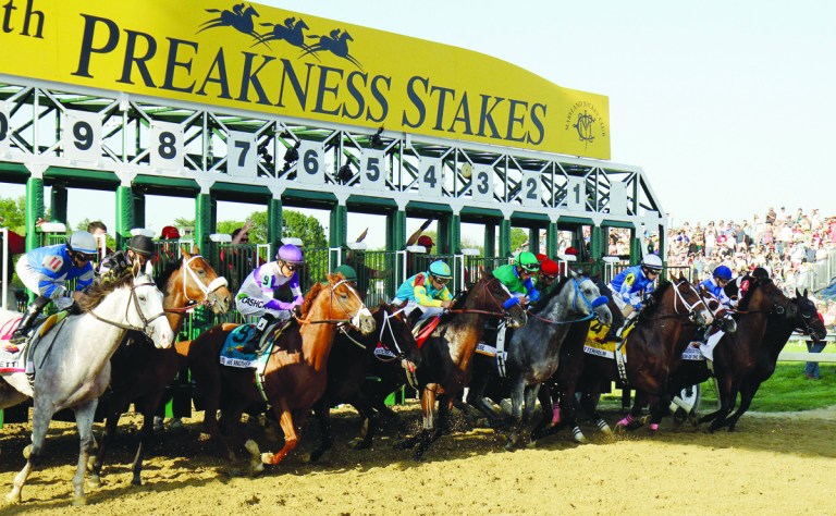 FILE - In this May 19, 2012 file photo, I'll Have Another (9), ridden by Mario Gutierrez, breaks from the starting gate along with the rest of field during the 137th Preakness Stakes horse race at Pimlico Race Course, in Baltimore. A long-term horse racing agreement was announced by Gov. Martin O'Malley Friday, Dec. 14, 2012, that says that next year's racing season will include 146 days of live racing days at the major Maryland tracks. (AP Photo/Garry Jones, File)
