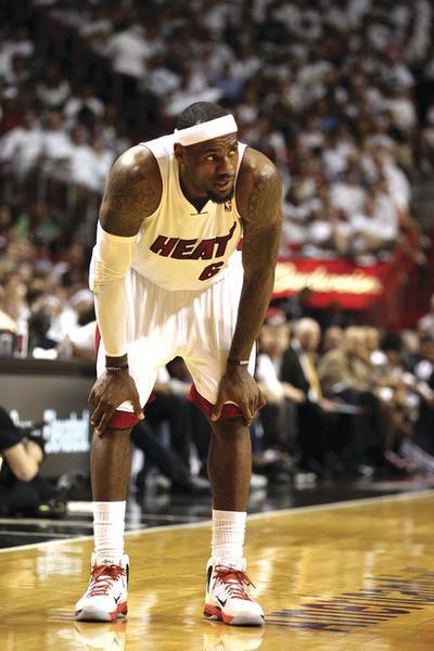 Marc Serota/Getty Images
Heat forward LeBron James was awarded the NBA MVP trophy prior to Sunday's game.