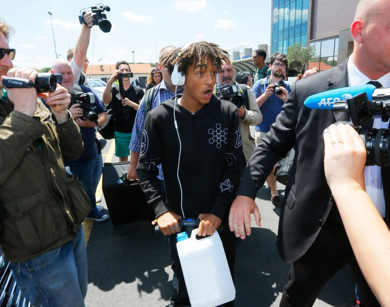 American actor and rapper Jaden Smith arrives in Florence, Italy, Saturday, May 24, 2014. Kim Kardashian and Kanye West will wed and host a reception at Florence's imposing 16th-century Belvedere Fort on May 24, according to a spokeswoman at the Florence mayor's office. The couple rented the fort, located next to Florence's famed Boboli Gardens, for 300,000 euros ($410,000) and a Protestant minister will preside over the ceremony. Belvedere Fort was built in 1590, believed using plans by Don Giovanni de' Medici. Located near the Arno River, it offers a panoramic view of Florence and the surrounding Tuscan hills. (AP Photo/Fabio Muzzi)