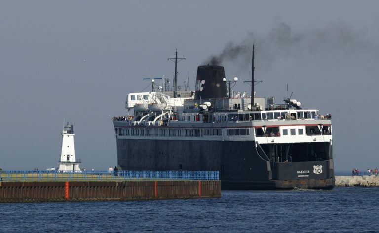   FILE - In this May 24, 2012 file photo, the Lake Michigan car ferry S.S. Badger departs Ludington, Mich., on the first voyage of the season to Manitowoc, Wis. A federal deadline passed Wednesday, Dec. 19, 2012 for the S.S. Badger ferryboat to stop dumping waste coal ash into Lake Michigan, and prospects were murky for the historic vessel that boosts the economy and civic pride in port towns on both sides of the water. (AP Photo/The Muskegon Chronicle, Ken Stevens) ALL LOCAL TV OUT; LOCAL TV INTERNET OUT  
