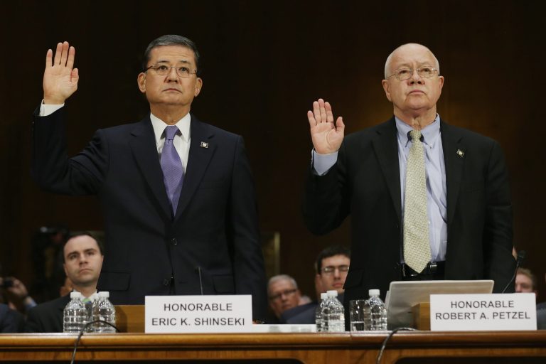 Veterans Affairs Secretary Eric Shinseki and Veterans Affairs Undersecretary for Health Robert Petzel are sworn in before testifying to the Senate Veterans' Affairs Committee about wait times veterans face  to get medical care May 15, 2014 in Washington. (Chip Somodevilla/Getty Images)