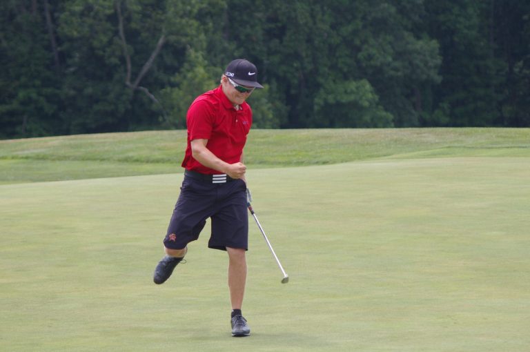  UNiversity of Maryland junior Sean Bosdosh exhorts as his 20-foot birdie putt rolls into the cup as he won by one stroke in the Maryland Open. / Photo by Kevin Dunleavy 
