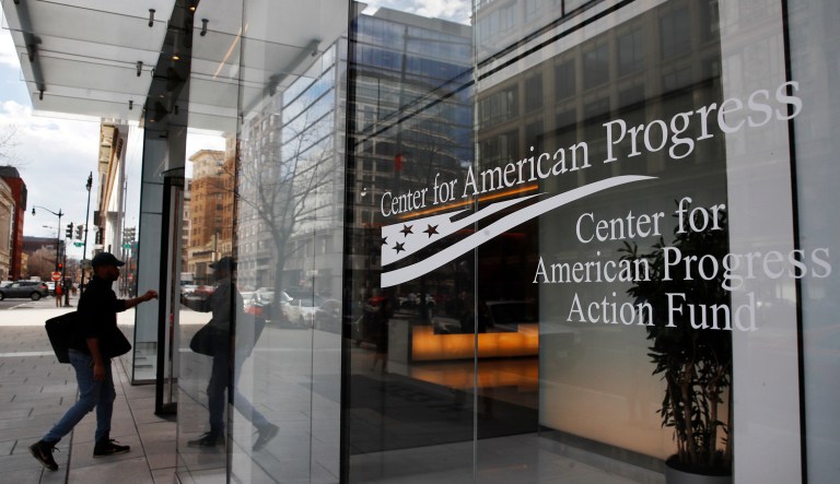 A man walks into the Center for American Progress, Wednesday, Feb. 21, 2018, at their office in Washington.