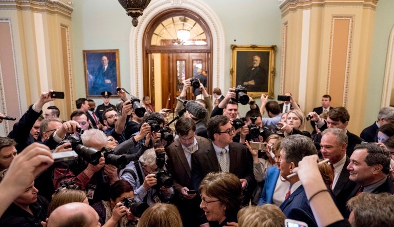The upper house of Congress turned into a madhouse over the weekend after senators' inaction on a spending bill sent the government into a partial shutdown. (AP Photo/Andrew Harnik)