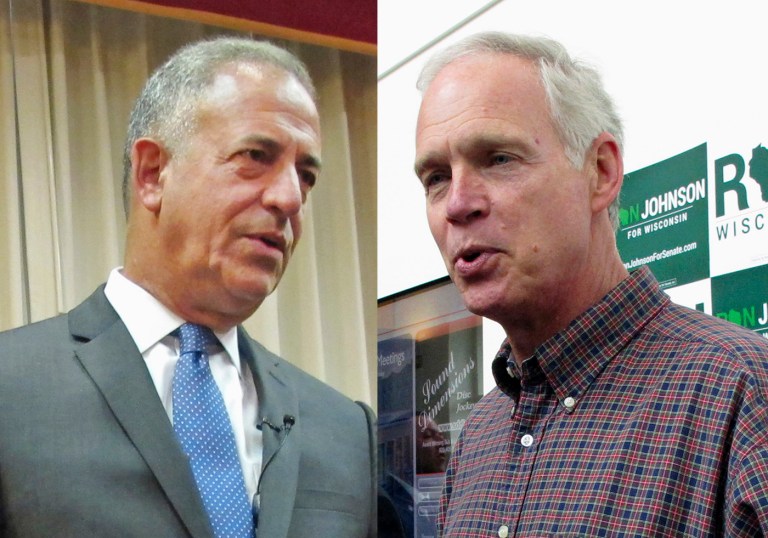 Ron Johnson, right, has raised $15 million over the past two years, while Russ Feingold has raised more than $20 million. (AP Photo/Scott Bauer, File)