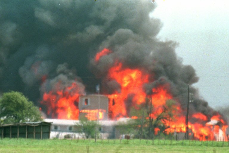 Fire engulfs the Branch Davidian compound near Waco, Texas, April 19, 1993. Eighty-one Davidians, including leader David Koresh, perished as federal agents tried to drive them out of the compound. U.S. military leaders were reluctant to assist in the siege of the  headquarters and questioned the legality of their role, the Waco Tribune-Herald reported. (AP Photo/Ron Heflin)