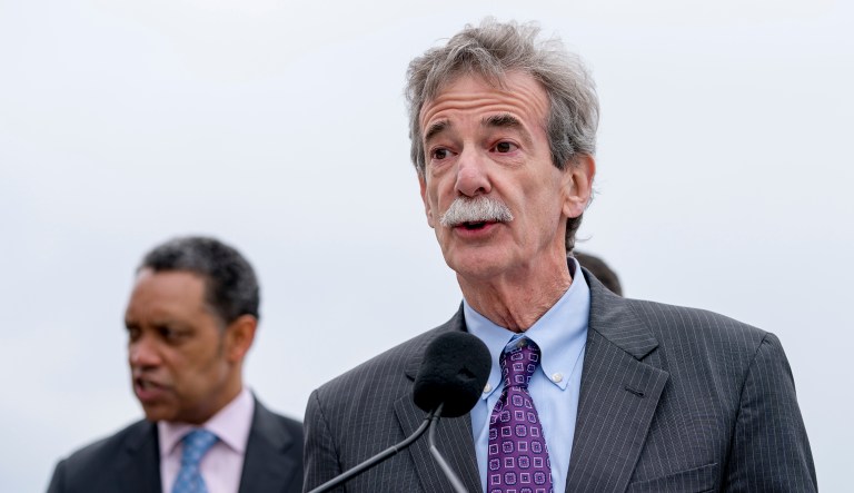In this photo from Monday, Maryland Attorney General Brian Frosh, right, accompanied by District of Columbia Attorney General Karl Racine, left, speaks at a news conference near the White House. They, along with several other attorneys general, are expressing confidence in their legal battles against the Trump administration's environmental policy. (AP Photo/Andrew Harnik)