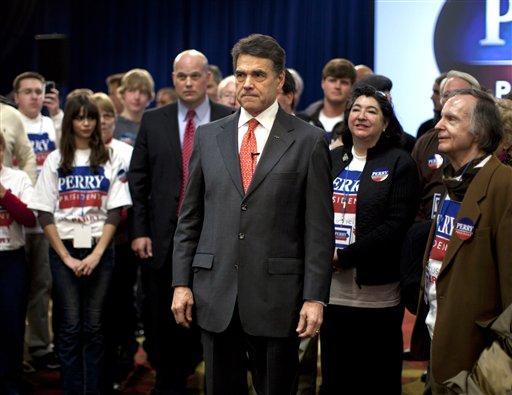 Perry vows to return to Texas to reassess campaign