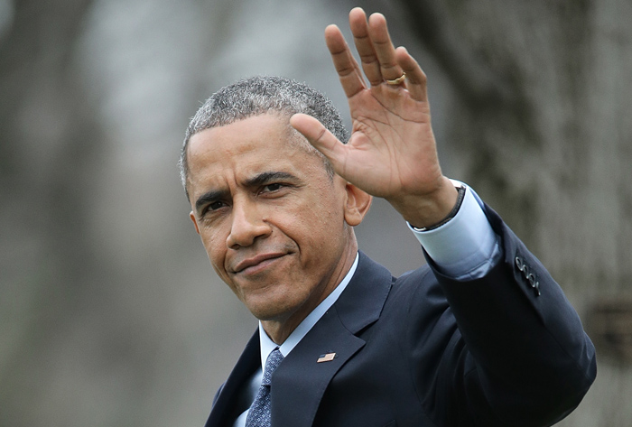 U.S. President Obama departs the White House on Jan. 14, 2015, in Washington. (Photo by Win McNamee/Getty images)