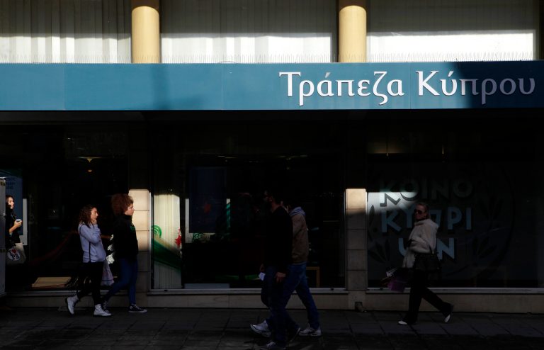   Pedestrians pass a branch of 