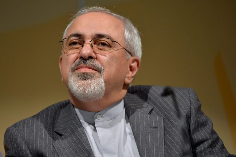 Iranian Foreign Minister Mohammad Javad Zarif briefs the media after the two days of closed-door nuclear talks, during a press conference at the CICG, in Geneva, Switzerland, Wednesday, Oct.16, 2013. (AP Photo/Keystone, Martial Trezzini)