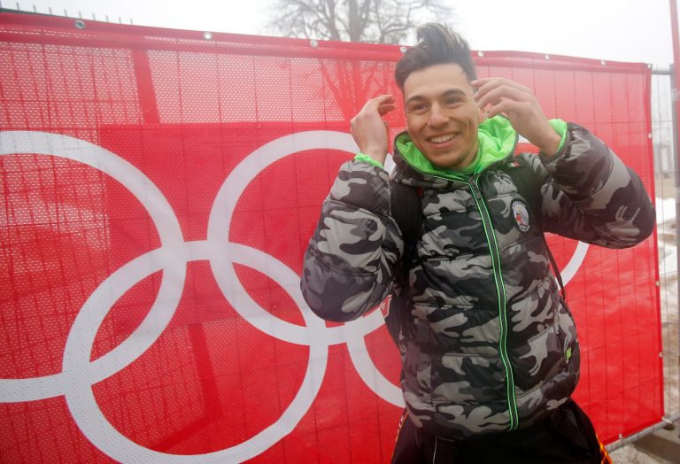 East Timor's Yohan Goncalves Goutt poses for a photo at the Sochi 2014 Winter Olympics, Monday, Feb. 17, 2014, in Krasnaya Polyana, Russia. Goncalves Goutt, 19, is preparing to compete as an Alpine skier in the Sochi Games, representing East Timor, whose officially recognized ski federation he founded. His race, the slalom, is Saturday night. (AP Photo/Christophe Ena)